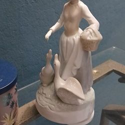 Girl Feeds The Ducks