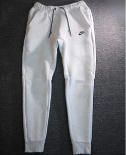 Nike tech light gray pants brand new with the bag