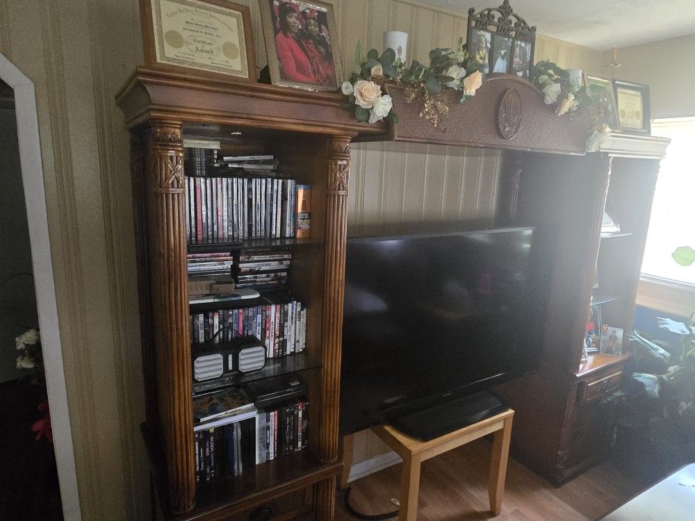 Wood Entertainment Center, Wood Table and Chairs,and Brown 6 Seater Sectional