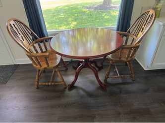 Dining table and 4 wooden chairs