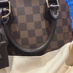 Alma BB · Damier Ebene coated canvas