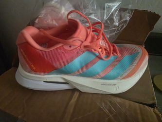 adidas Adizero Boston 13 running shoes in the Semi Coral, Flash Aqua, and Flash Orange colorway.  Women size 9 / 9.5
