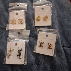 Designer, earrings. Gold color silver color stainless steel studs