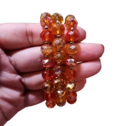 Silver Toned Iridescent Orange Beaded Stretchy Bracelets Trio