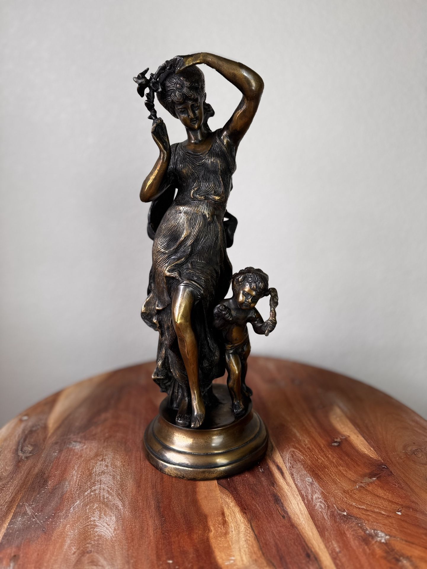 Bronze Statue Of Dancing Woman With Cherub