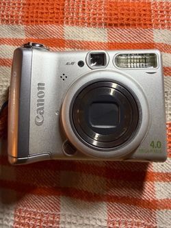 Canon Powershot A520 https://offerup.com/redirect/?o=NC5NUA== Color silver Digital Camera