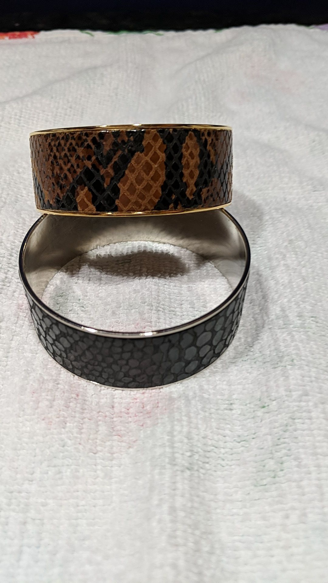 Two snakeskin bangle bracelets