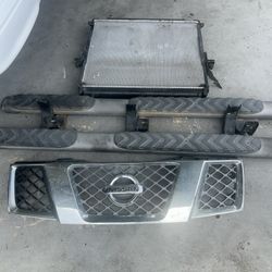 Nissan Frontier, Radiator, Grill , And Steps