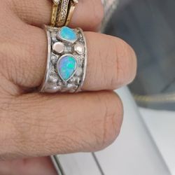 Sterling silver/14k Accents pear shape blue opal. 6.5