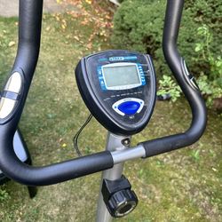 excercise bike and coffee table 