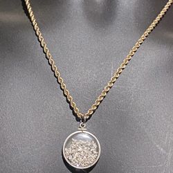 Necklace20” 10k 3.5mm rope necklace with a large see-through pendant with silver