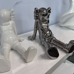 White or chrome Kaws sitting Art sculpture (price for each)