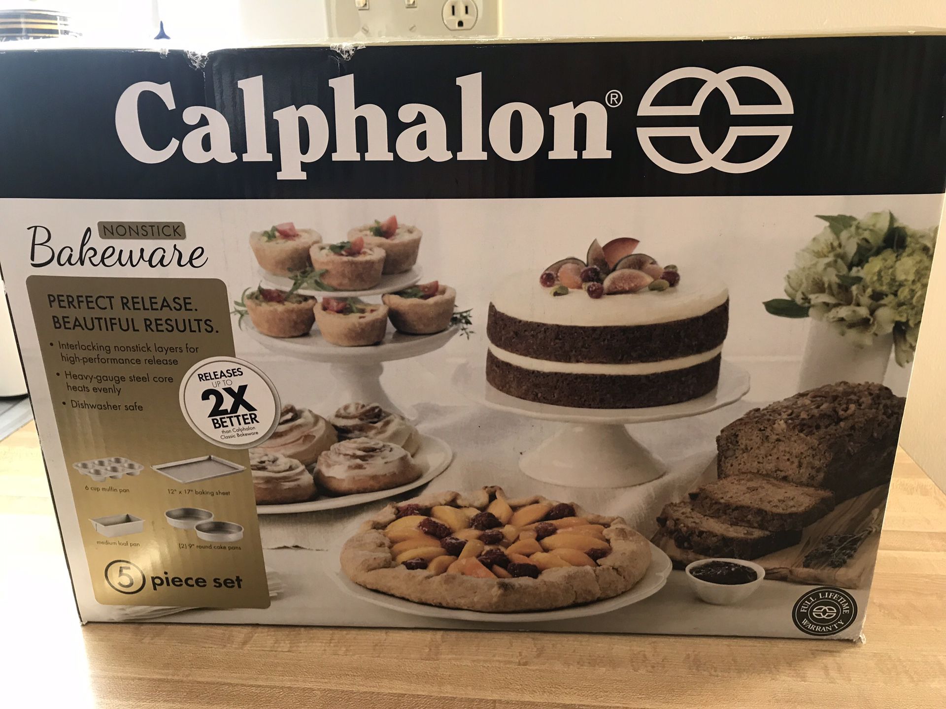 calphalon 5 piece bakeware set 6 cup muffin pan 12" x 17" baking sheet Medium loaf pan Two round 9" cake pans