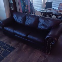 $150 OBO. Brown Leather Pull Out Couch Bed. Great Condition! 