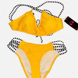 cute yellow bikini! Ribbed texture with striped straps and a unique back design.