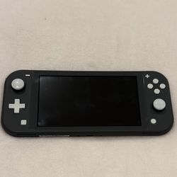 Gray Nintendo Switch lite with charger