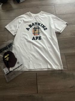Bape shirt size small but fits like a medium