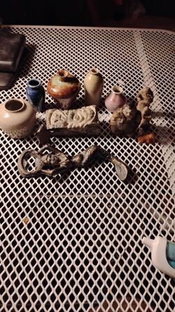 Small ceramic vase figures and carved stone