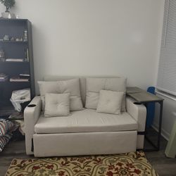 beige pull out love seat couch