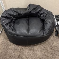 Massaging bean bag chair