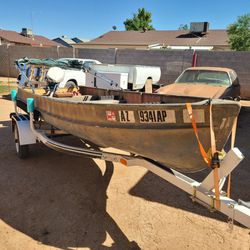 14 ft Aluminum Boat And Trailer With 9.5 Outboard 