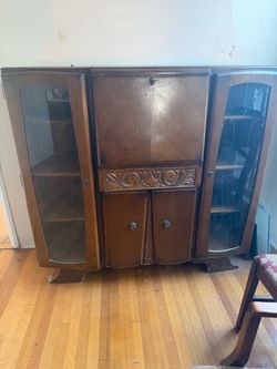 Vintage wood secretary cabinet/display hutch with glass and carved details