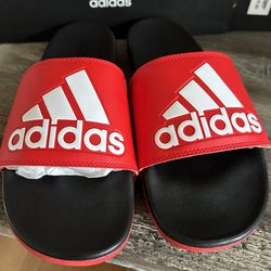 MENS SIZE 11/WMN SIZE 12 ADIDAS NEW!!!!