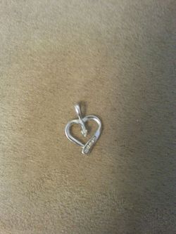 White gold heart and diamond pendant