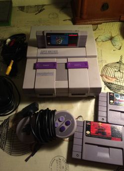 Super Nintendo system three games