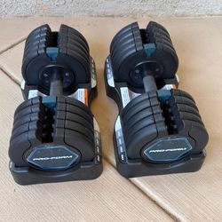 2 Adjustable Dumbbells (up to 50lbs each)