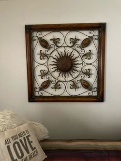 Metal iron wall piece.