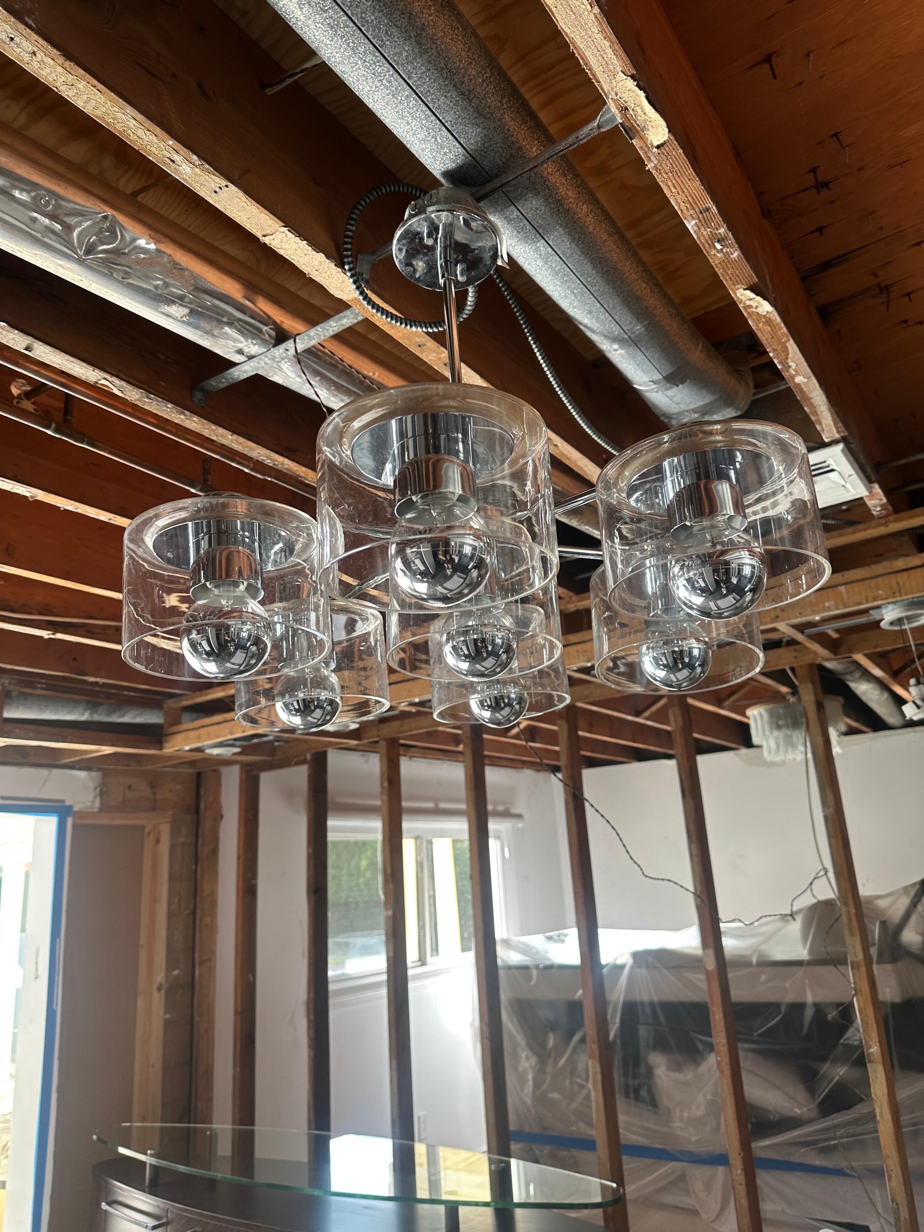 Globe-style bulbs with a mirror-chrome finish Chandelier 