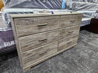 Brand new Ashley Furniture gray color chest