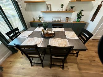 Sold table with 9 chairs