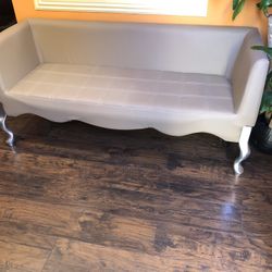 Custom-made green leather loveseat like new condition barely used Measurements.  64” L x 24” W x 29” H $375