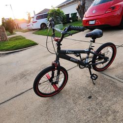Red and Black colored Bike