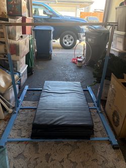 Gymnastics bar and mat