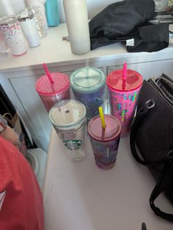 Starbucks Cups And A Hydro Jug