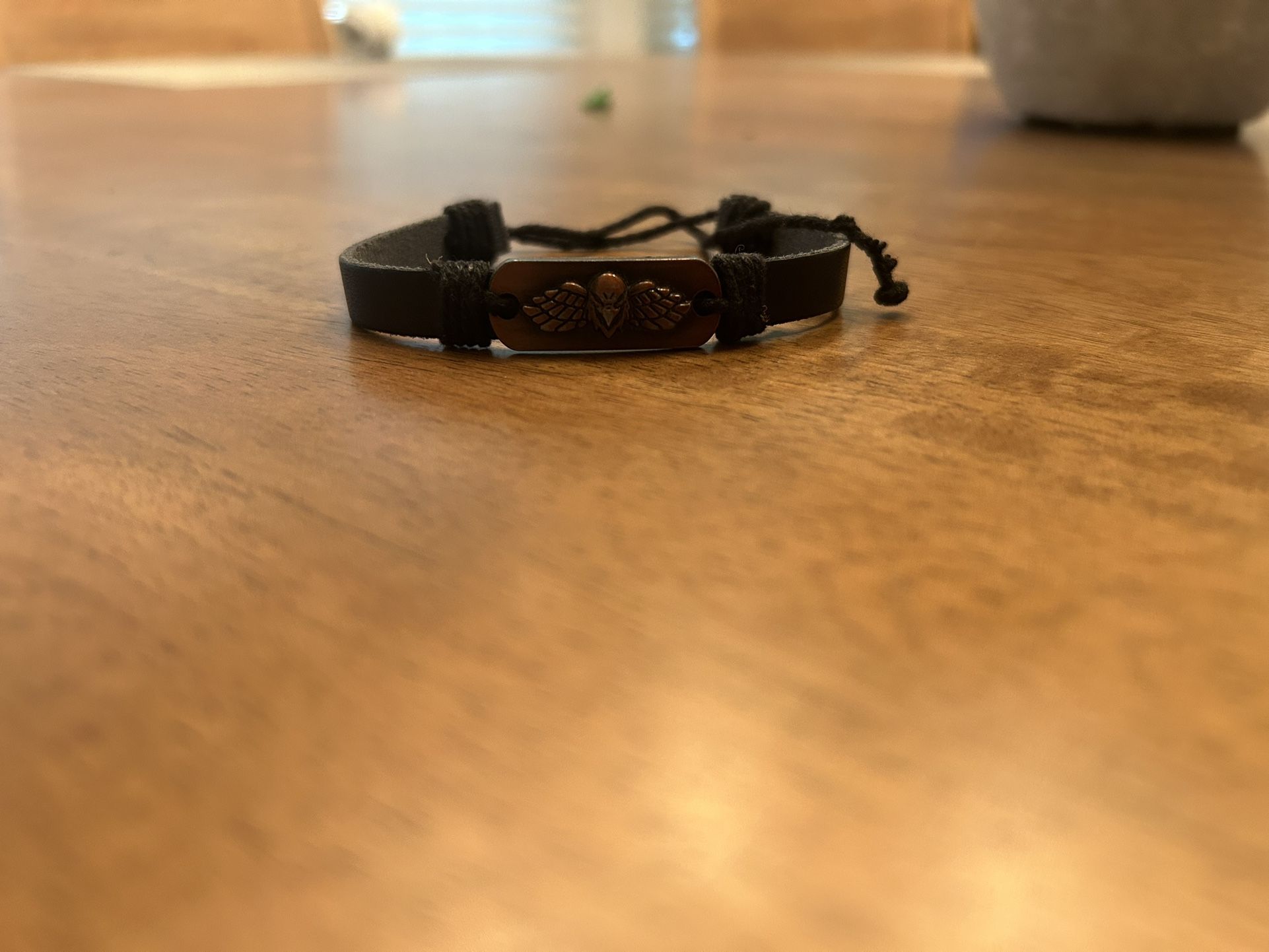 Leather Bracelet With Wing Design