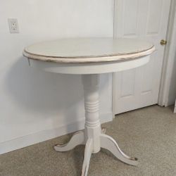 Heavy Antiqued Cream / White Table 36' Across 42' Height
Tall bistro table
Has some green dots on top.
