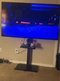 Adjustable Pedestal TV Stand