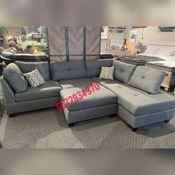 Gray sectional sofa with ottoman 
