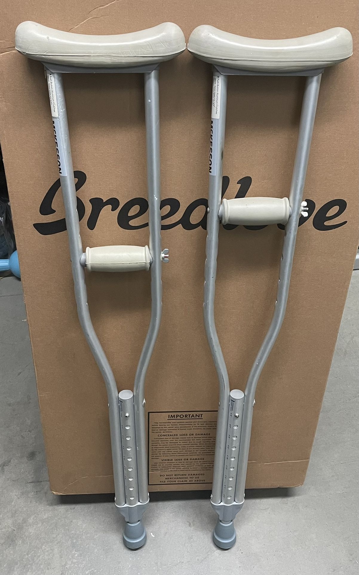 Set of McKesson Push-Button Adjustable Aluminum Crutches – Tall Adult