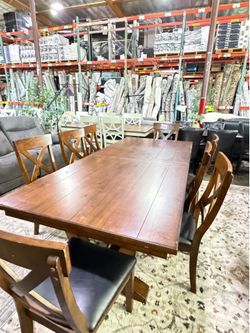 Dining set with black leather chairs