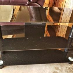 Heavy Black Glass TV Stand.