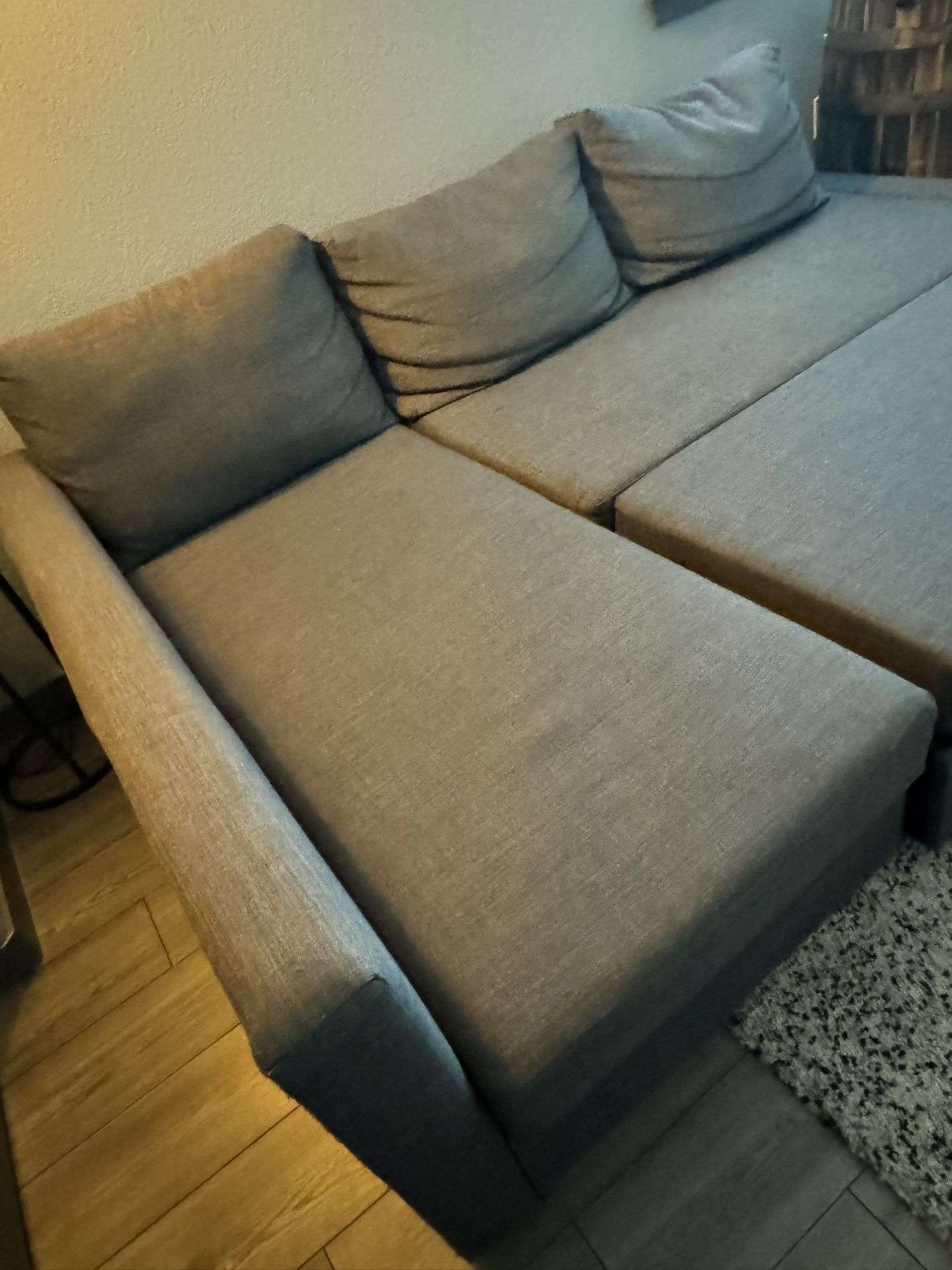 "Modern Gray Sofa with Pull-Out Bed – $200 Only!"