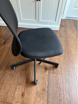 Black office chair.  Swivels and adjusts