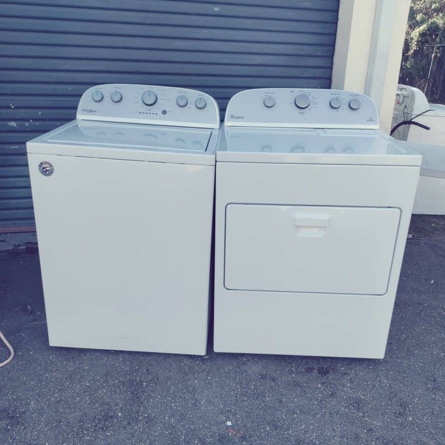 like new matching Whirlpool washer dryer set huge no agitator tub pull down drawer for the