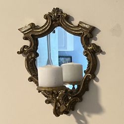 Mirror/candle sconce