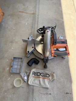 RIDGID 10” Sliding Compound Miter Saw MS1065LZ –– Sliding – Includes Dust Bag Working fine